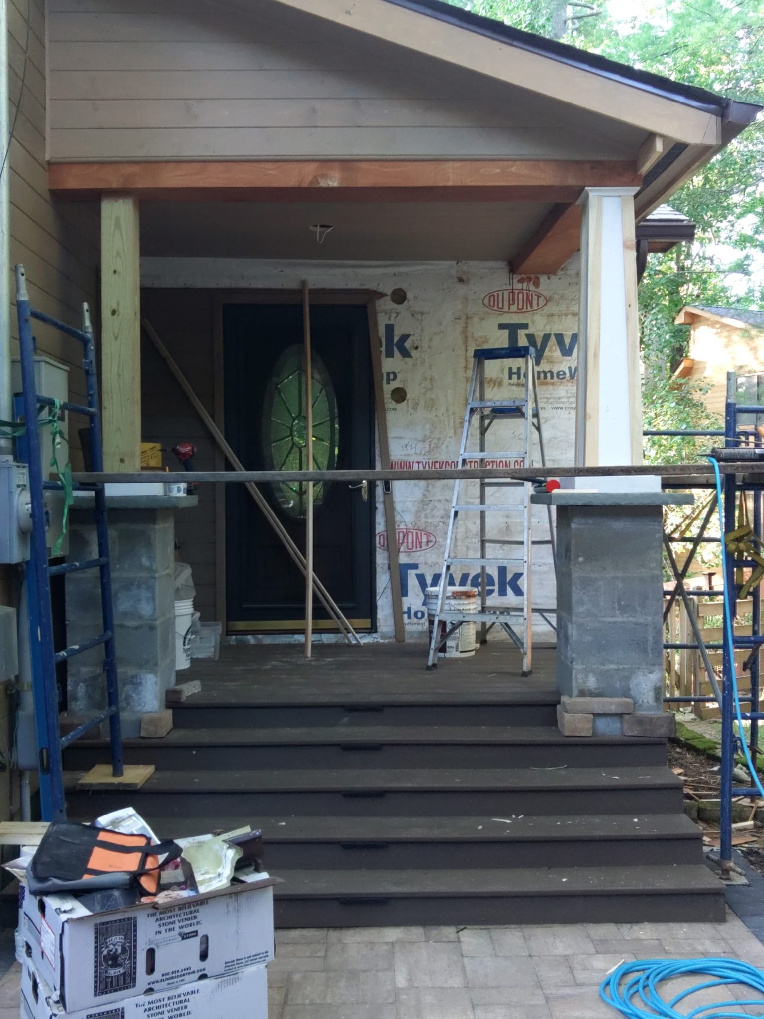 Front entrance remodeling with siding and porch work in progress